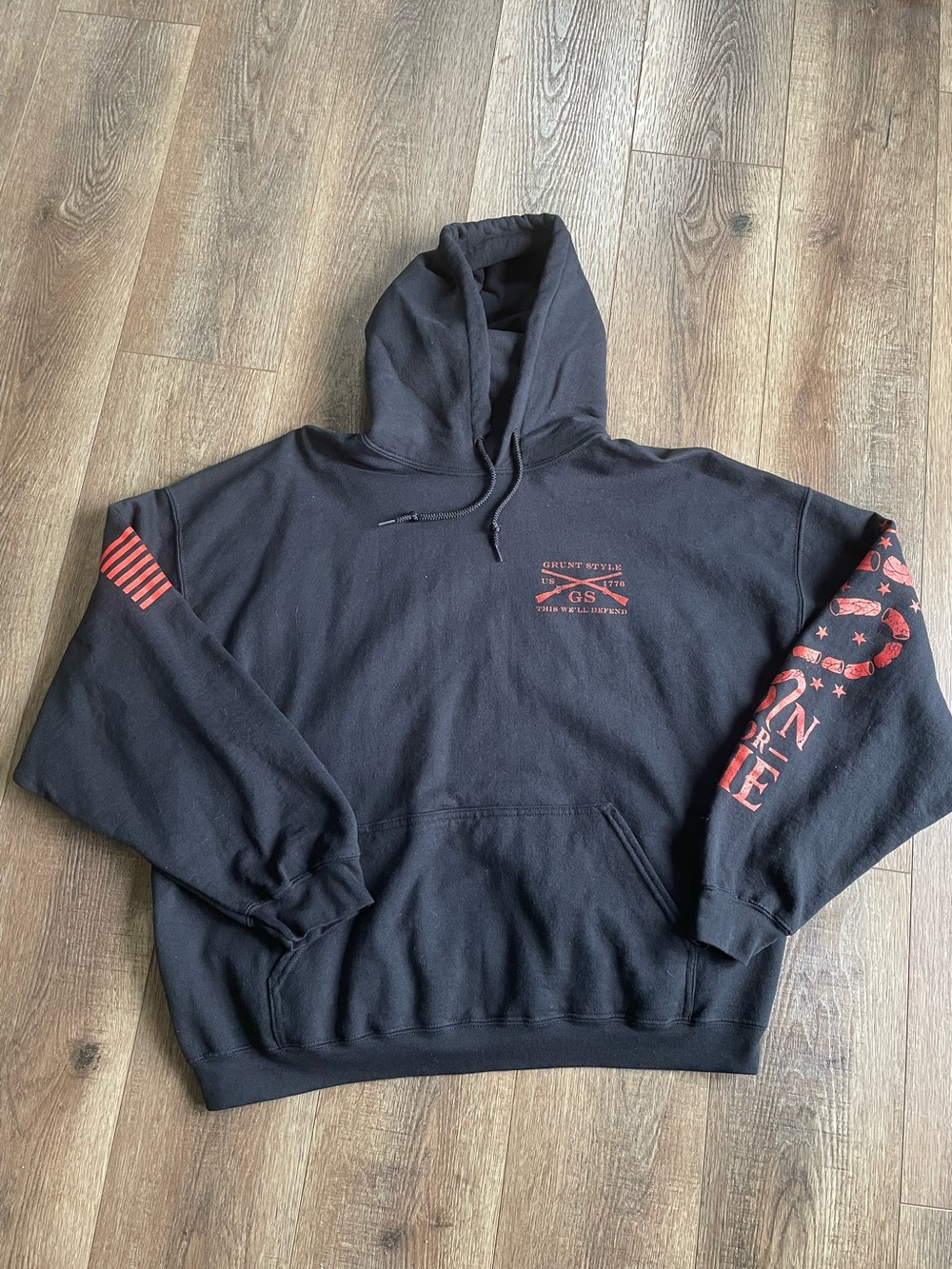 Grunt Style Black Pullover Hoodie with Red Sleeve and Chest Graphics